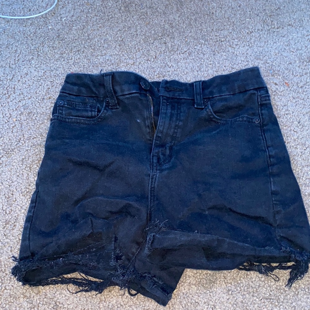 black jean shorts with rips